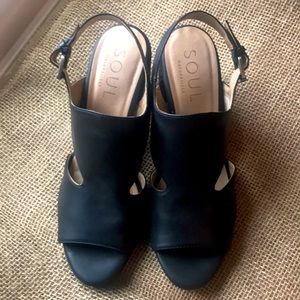 Black women wedge sandals with peep toes.